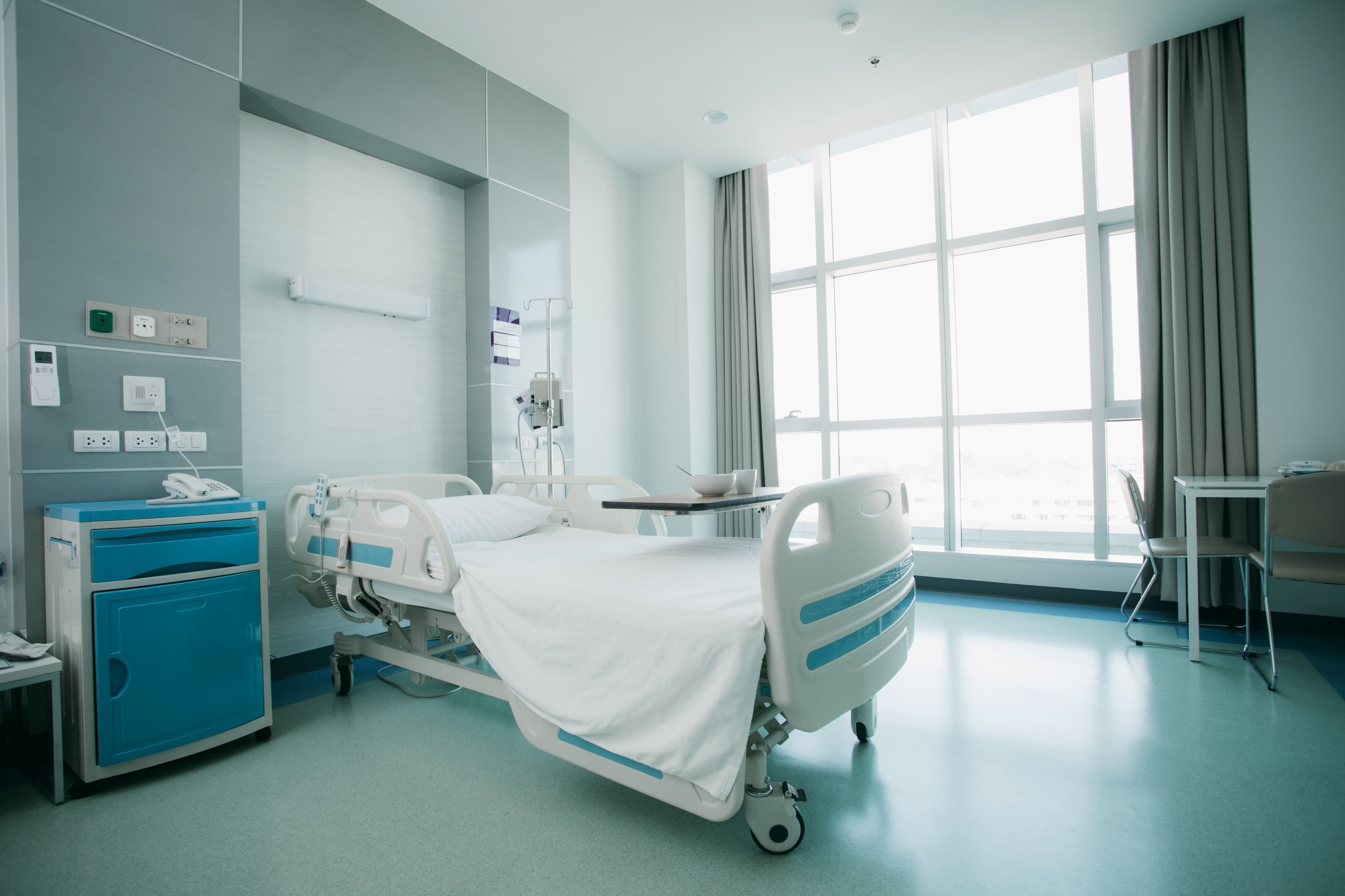 recovery-room-with-beds-comfortable-medical-interior-empty-hospital-room-clean-empty-room-with-bed-new-medical-center.jpg