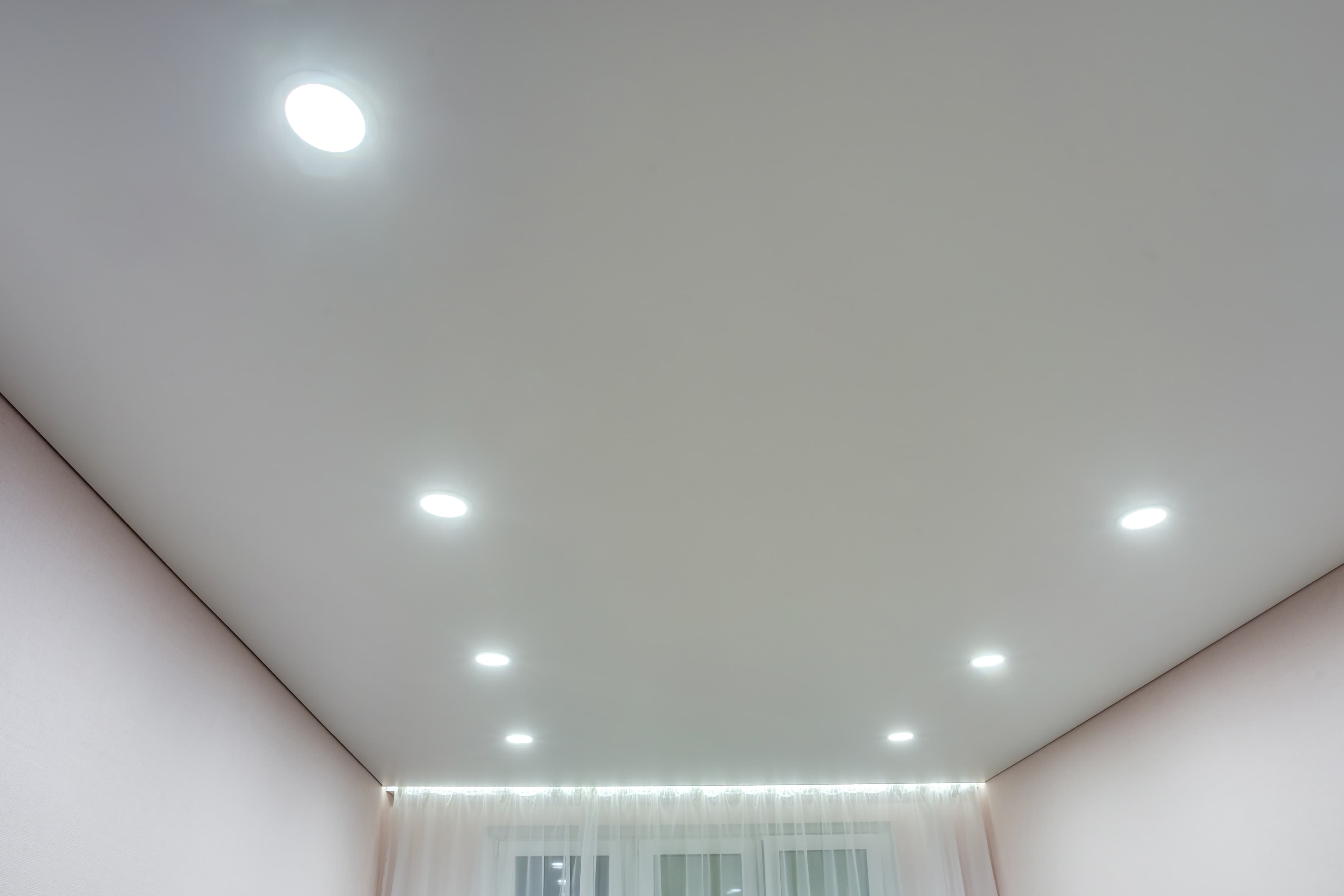 suspended-ceiling-with-halogen-spots-lamps-drywall-construction-empty-room-apartment-house-stretch-ceiling-white-complex-shape copy 2.jpg