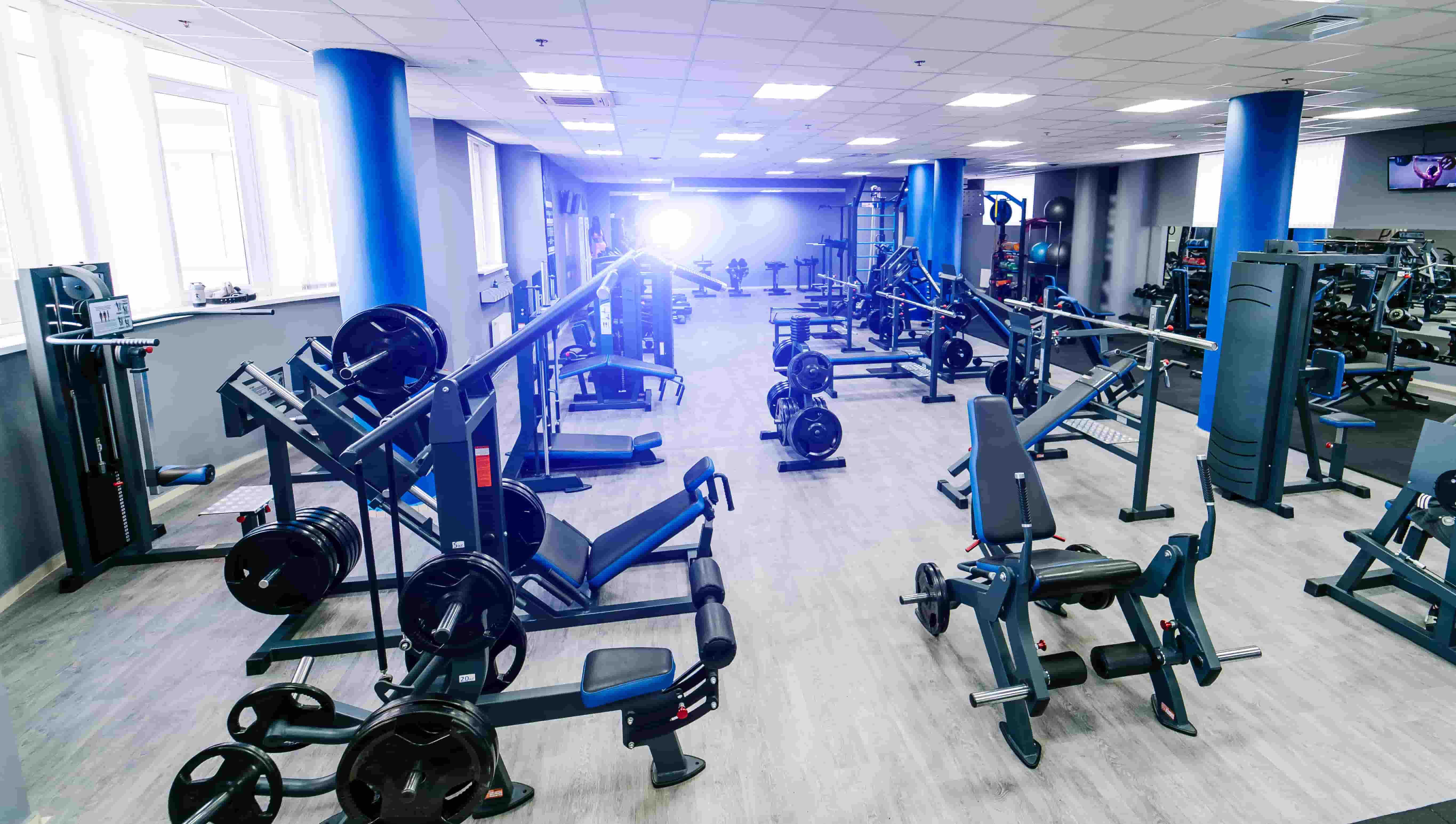 empty-fitness-center-hall-modern-empty-gym-interior-with-equipment-different-sport-equipment-modern-gym-closeup.jpg